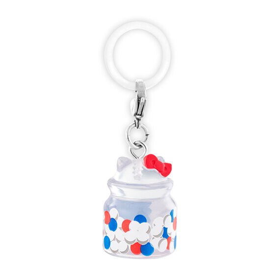 Monchhichi x Hello Kitty marker charm gashapon - capsule and display presentation