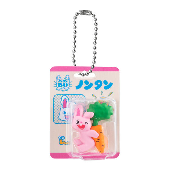 Non-tan Package Miniature Collection capsule toy, rear view of a blister-package charm